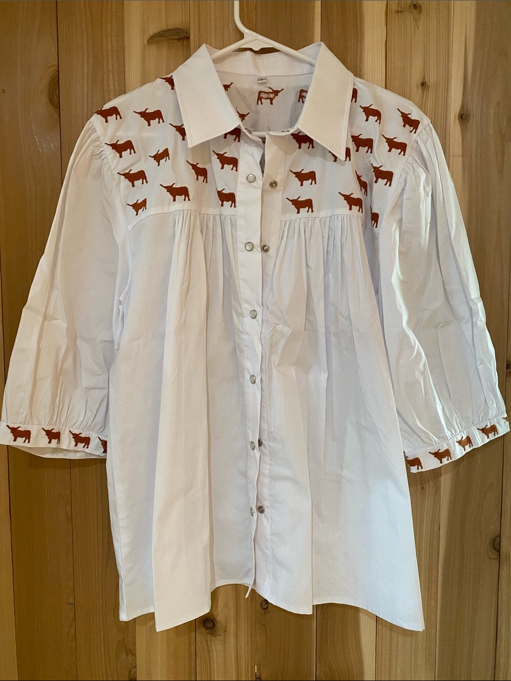 White Cotton Button-Front Blouse with Orange Embroidered Longhorns.